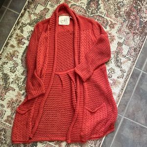 Angels of the North crocheted burnt orange cardigan